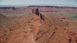 5.5K aerial stock footage of flyby butte to approach a second butte in Moab, Utah Aerial Stock Footage | AX137_144E