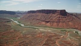 5.5K aerial stock footage approach the Colorado River and Dry Mesa in Moab, Utah Aerial Stock Footage | AX137_149