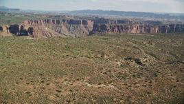 5.5K aerial stock footage of a view of Big Bend Canyon and the Colorado River in Arches National Park, Utah Aerial Stock Footage | AX138_011E