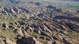 5.5K aerial stock footage of a view of petrified sand dunes at Sand Flats Recreation Area, Moab, Utah Aerial Stock Footage | AX138_034E