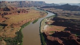 5.5K aerial stock footage fly over Colorado River and approach Pyramid Butte, Moab, Utah Aerial Stock Footage | AX138_059E