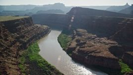 5.5K aerial stock footage of the Colorado River flowing through Meander Canyon, Canyonlands National Park, Utah Aerial Stock Footage | AX138_073E