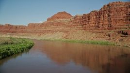5.5K aerial stock footage fly through Meander Canyon, follow Colorado River to shady area, Canyonlands National Park, Utah Aerial Stock Footage | AX138_099E