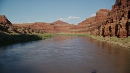 5.5K aerial stock footage fly low through Meander Canyon over the Colorado River, Canyonlands National Park, Utah Aerial Stock Footage | AX138_102E
