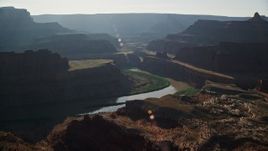 5.5K aerial stock footage pass over the Colorado River and Meander Canyon to approach Shafer Canyon, Canyonlands National Park, Utah Aerial Stock Footage | AX138_114E