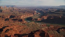 5.5K aerial stock footage of desert mesas by Meander Canyon and Colorado River in Moab, Utah Aerial Stock Footage | AX138_168E