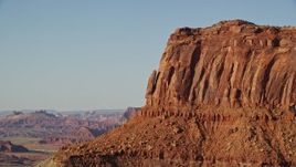 5.5K aerial stock footage approach and tilt to rock formation on a cliff in Moab, Utah Aerial Stock Footage | AX138_192E