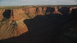 5.5K aerial stock footage pan across a wide desert canyon in Moab, Utah Aerial Stock Footage | AX138_206E