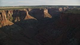 5.5K aerial stock footage fly over a canyon in shadow in Moab, Utah Aerial Stock Footage | AX138_208E