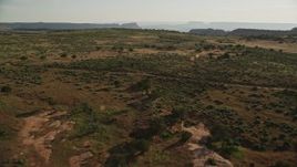 5.5K aerial stock footage fly over desert and approach Hatch Point Road near Moab, Utah Aerial Stock Footage | AX138_227