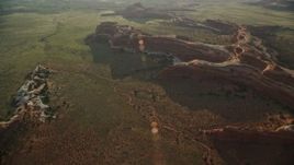5.5K aerial stock footage tilt and fly over desert rock formations in Canyonlands National Park, Utah Aerial Stock Footage | AX138_279