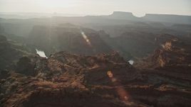 5.5K aerial stock footage orbit The Loop East in Meander Canyon and Colorado River, Canyonlands National Park, Utah, sunset Aerial Stock Footage | AX138_290E
