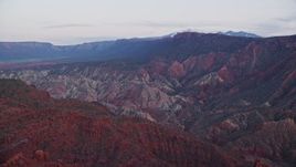 5.5K aerial stock footage of approaching desert mountains near Fisher Towers, Utah, twilight Aerial Stock Footage | AX138_443