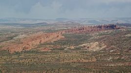 5.5K aerial stock footage of a view of Devil's Garden rock formations, Arches National Park, Utah Aerial Stock Footage | AX139_008E