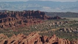 5.5K aerial stock footage of rock formations at Devil's Garden, Arches National Park, Utah Aerial Stock Footage | AX139_013