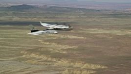 5.5K aerial stock footage of tracking Tecnam P2006T flying over desert, Grand County, Utah Aerial Stock Footage | AX139_062E