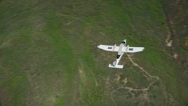 5.5K aerial stock footage of flying over a Tecnam P2006T near green mountain ridge, Wasatch Range, Utah Aerial Stock Footage | AX140_112