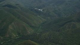 5.5K aerial stock footage focus on a Tecnam P2006T near snow-capped peaks in the Wasatch Range, Utah Aerial Stock Footage | AX140_120E