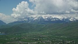 5.5K aerial stock footage of a wide view of snow-capped Mount Timpanogos, seen from Midway, Utah Aerial Stock Footage | AX140_183E
