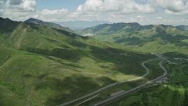 5.5K aerial stock footage of Interstate 80 through mountains in the Wasatch Range, Utah Aerial Stock Footage | AX140_236E