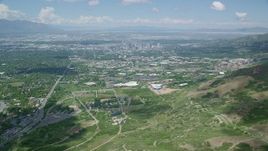 5.5K aerial stock footage of approaching the University of Utah, Downtown Salt Lake City, Utah Aerial Stock Footage | AX140_244