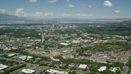 5.5K aerial stock footage fly over University of Utah, Jon M. Huntsman Center to approach Downtown Salt Lake City, Utah Aerial Stock Footage | AX140_247E