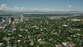 5.5K aerial stock footage of fying over neighborhoods, focus on Utah State Capitol Aerial Stock Footage | AX140_252