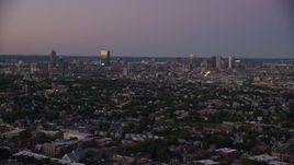 5.5K aerial stock footage approaching the skyline, Downtown Boston, Massachusetts, twilight Aerial Stock Footage | AX141_010E