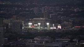 5.5K aerial stock footage flying by a baseball game at Fenway Park, Boston, Massachusetts, twilight Aerial Stock Footage | AX141_012E