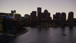 5.5K aerial stock footage approaching Two International Place, skyline, Downtown Boston, Massachusetts, twilight Aerial Stock Footage | AX141_023E