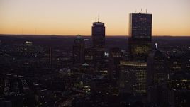 5.5K aerial stock footage flying by 111 Huntington Avenue, Prudential Tower, 200 Clarendon, Downtown Boston, Massachusetts, twilight Aerial Stock Footage | AX141_037