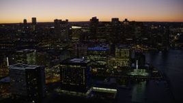5.5K aerial stock footage flying by skyline, harbor, Downtown Boston, Massachusetts, twilight Aerial Stock Footage | AX141_047E