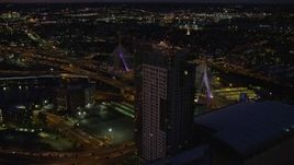 5.5K aerial stock footage approaching Avalon North Station, TD Garden, and Zakim Bridge, Downtown Boston, Massachusetts, night Aerial Stock Footage | AX141_061E