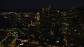 5.5K aerial stock footage approaching Custom House Tower, Downtown Boston, Massachusetts, night Aerial Stock Footage | AX141_075E