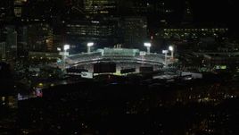 5.5K aerial stock footage flying by baseball game in progress, Fenway Park, Boston, Massachusetts, night Aerial Stock Footage | AX141_083