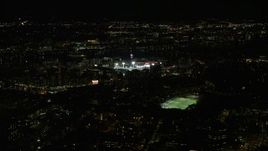 5.5K aerial stock footage flying away from a baseball game, Fenway Park, Boston, Massachusetts, night Aerial Stock Footage | AX141_133