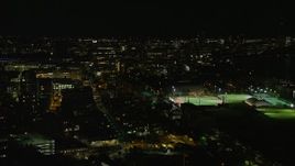 5.5K aerial stock footage flying by Massachusetts Institute of Technology, Cambridge, Massachusetts, night Aerial Stock Footage | AX141_144E