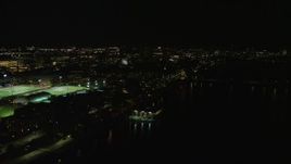5.5K aerial stock footage flying by sports fields, Massachusetts Institute of Technology, Cambridge, Massachusetts, night Aerial Stock Footage | AX141_161