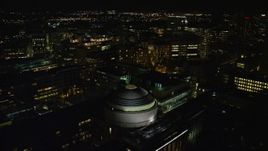 5.5K aerial stock footage approaching and flying over Massachusetts Institute of Technology, Cambridge, Massachusetts, night Aerial Stock Footage | AX141_162E