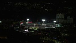 5.5K aerial stock footage orbiting city streets, baseball game at Fenway Park, Boston, Massachusetts, night Aerial Stock Footage | AX141_181E