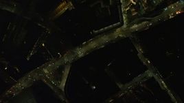 5.5K aerial stock footage of a bird's eye view over downtown city streets, Boston, Massachusetts, night Aerial Stock Footage | AX141_205E