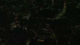 5.5K aerial stock footage approaching One Beacon Street, tilt down, Downtown Boston, Massachusetts, night Aerial Stock Footage | AX141_215