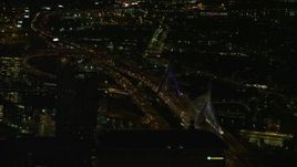 5.5K aerial stock footage flying by the Zakim Bridge, Boston, Massachusetts, night Aerial Stock Footage | AX141_241