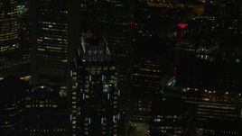 5.5K aerial stock footage flying by One Boston Place, Downtown Boston, Massachusetts, night Aerial Stock Footage | AX141_242