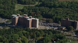 5.5K aerial stock footage approaching Lemuel Shattuck Hospital, autumn, Jamaica Plain, Massachusetts Aerial Stock Footage | AX142_013E