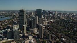 5.5K aerial stock footage flying over buildings in autumn, approaching Downtown Boston, Massachusetts Aerial Stock Footage | AX142_019E
