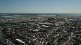 5.5K aerial stock footage approaching, flying over Logan International Airport, East Boston, Massachusetts Aerial Stock Footage | AX142_027E