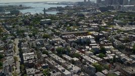 5.5K aerial stock footage flying by Bunker Hill Monument, row houses, Charlestown, Massachusetts Aerial Stock Footage | AX142_182