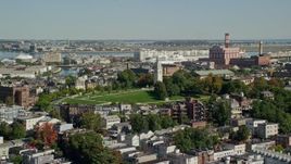 5.5K aerial stock footage flying by Dorchester Heights Monument, South Boston, Massachusetts Aerial Stock Footage | AX142_207