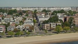 5.5K aerial stock footage flying by beachfront homes, South Boston, Massachusetts Aerial Stock Footage | AX142_212
